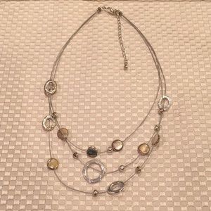 Wire layered necklace with beads.